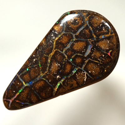 SOLID BOULDER OPAL Perfect flagstones surrounded by gem opal rivers, bright sparkles. Red, orange, green, blue.